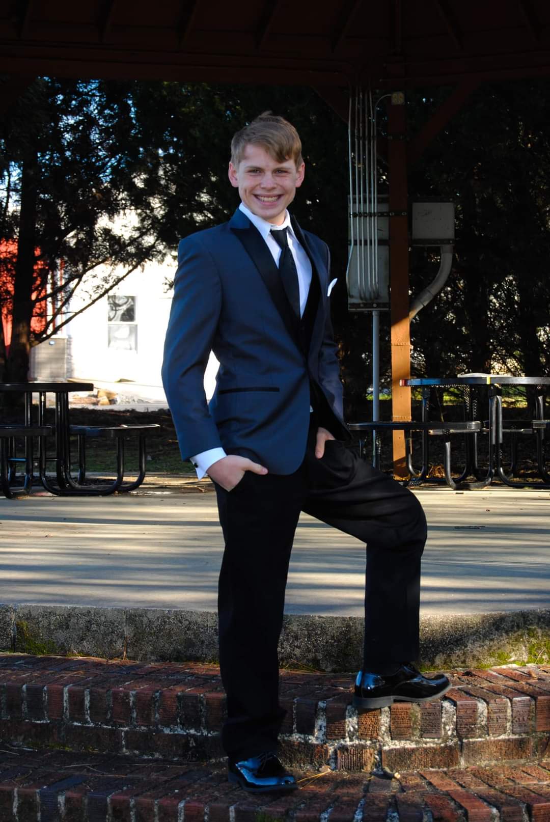 Image of Christopher in a suit